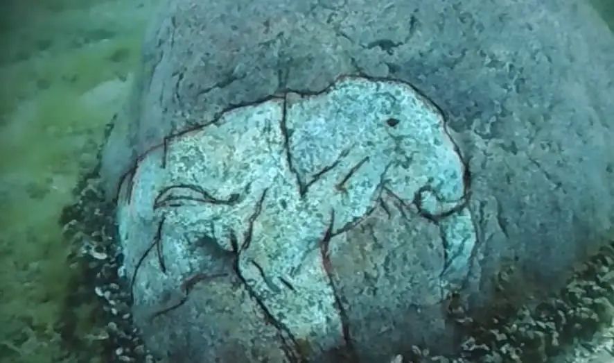 Researchers find a rock with a carving of a Mastodon at the underwater Stonehenge of Lake Michigan
